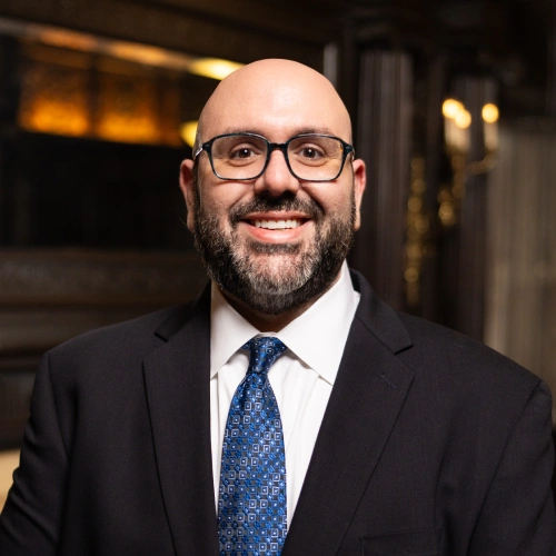Headshot for Gregory D. Benjamin.