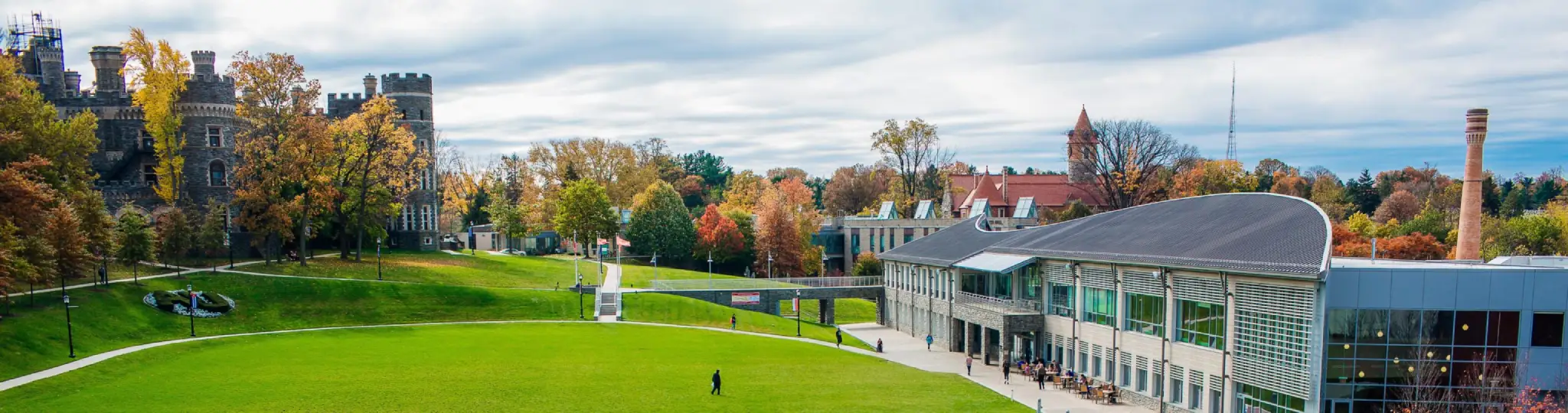 Wide shot of Arcadia Campus with Greys Tower Castle in background