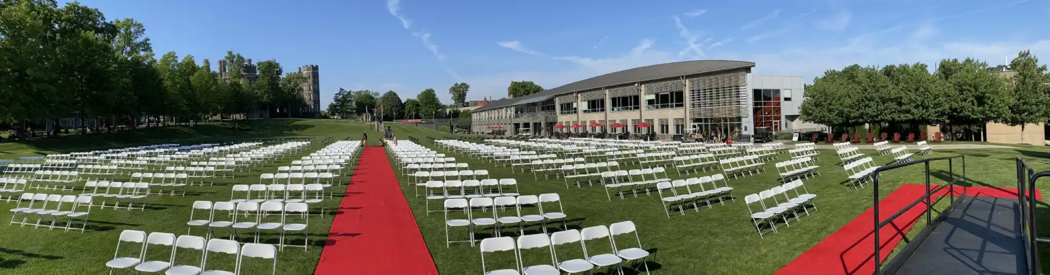 Haber Green set up for graduation with chairs and a red carpet before guests arrive