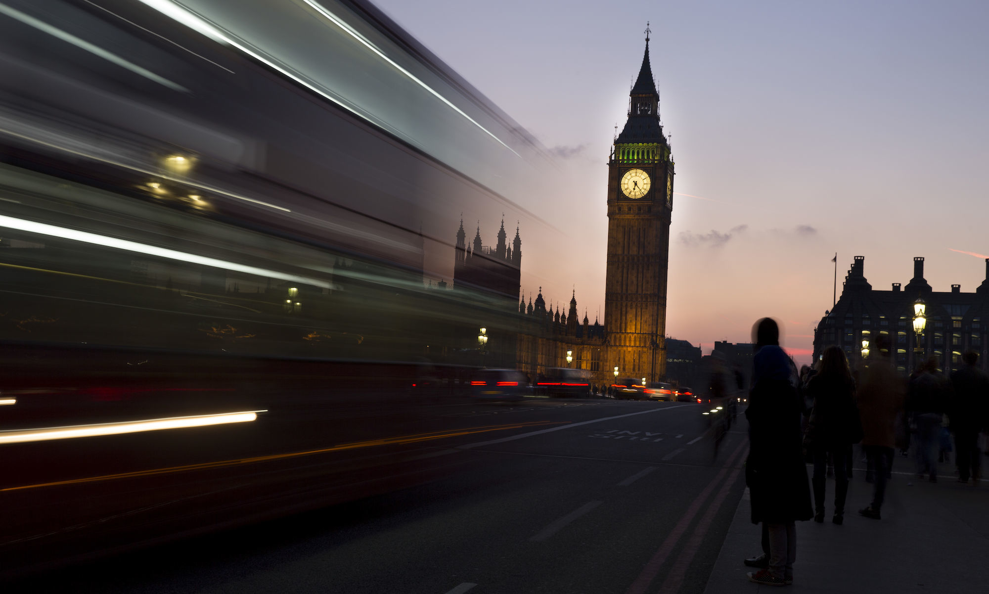 London's Big Ben clock tower during sunset with streaks on side of photo