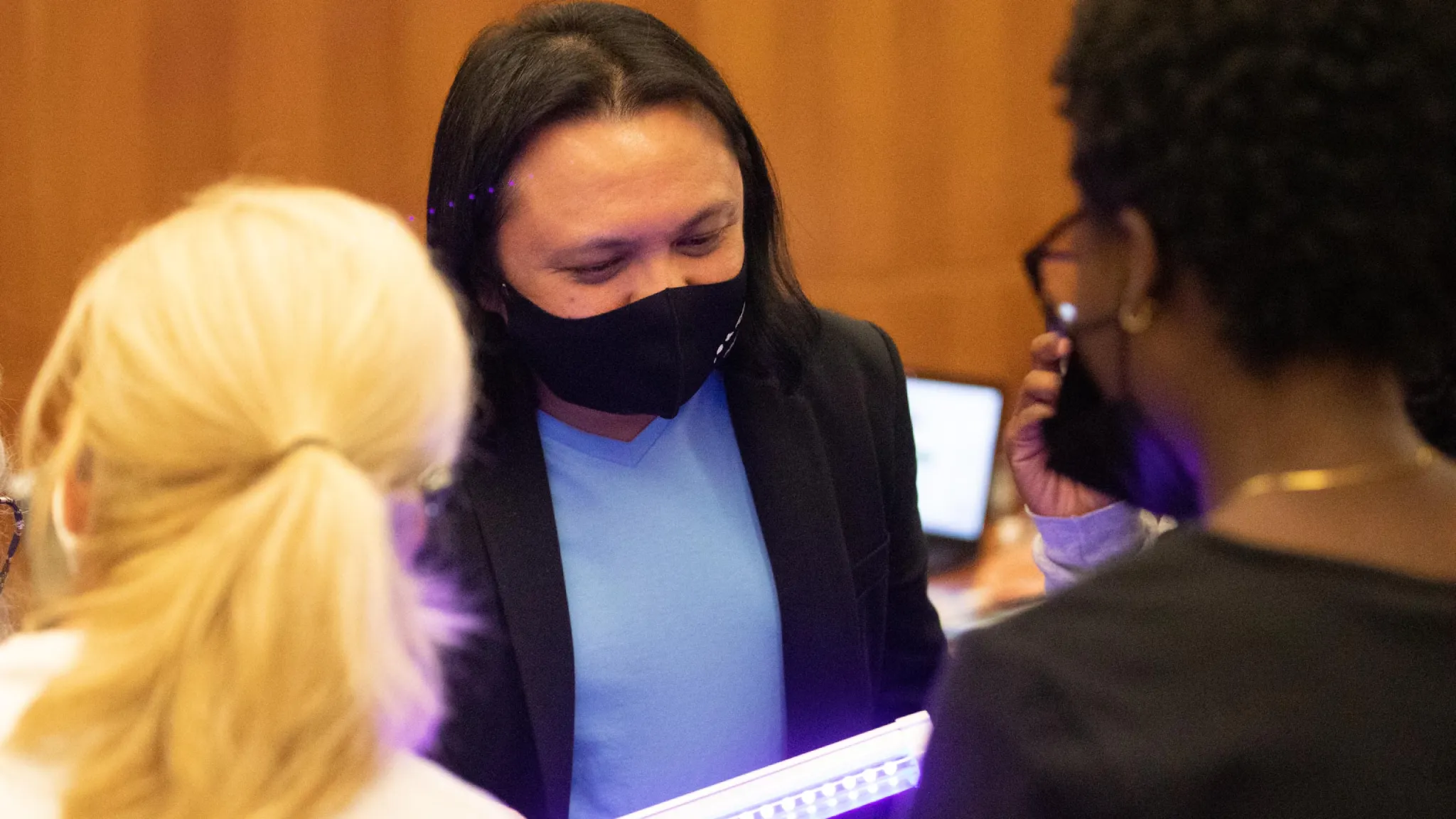 Professor Augusto Macalalag demonstrates an ultraviolet light at a STEM workshop.