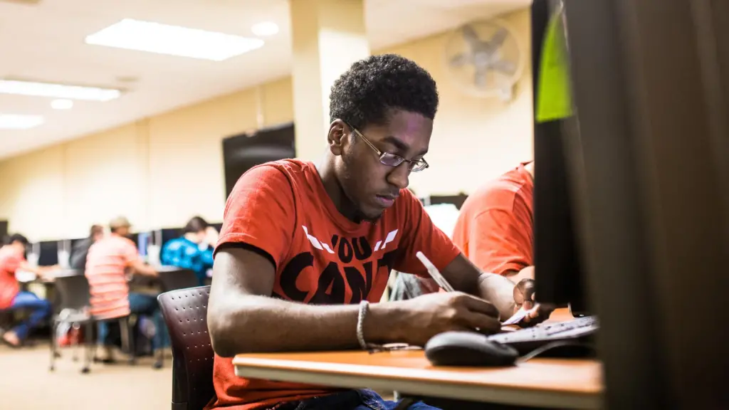 A student works in a computer lab.