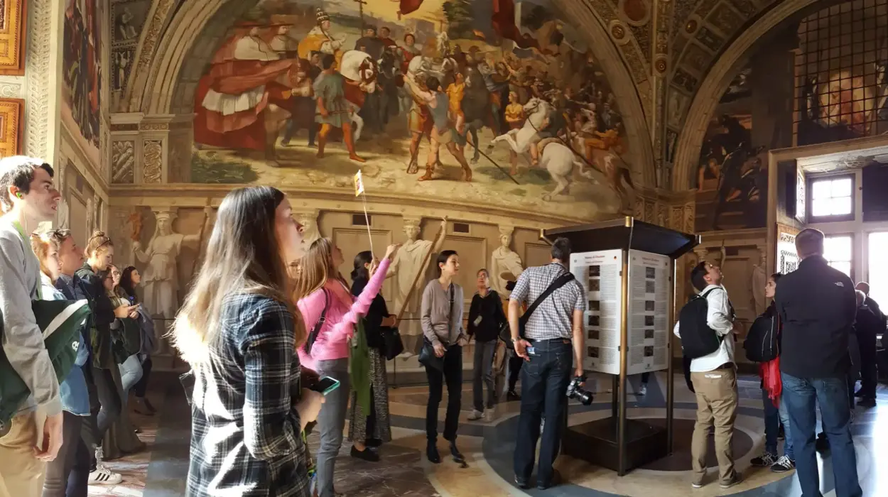 Students walk through a museum in Italy