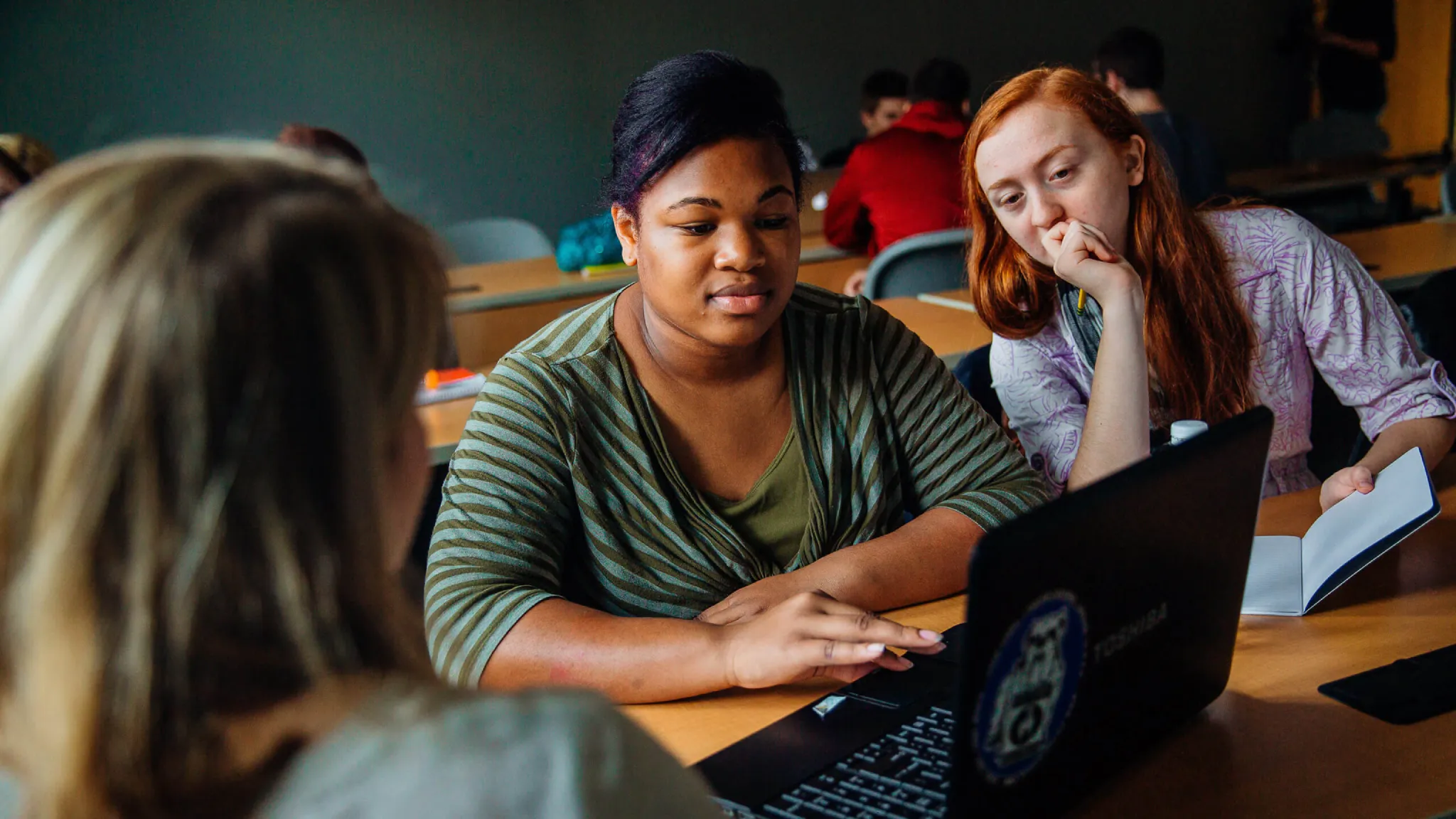 Arcadia students study in a classroom on campus