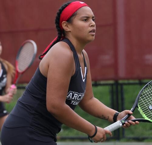 action shot of female tennis players