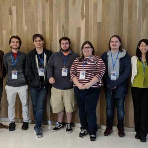 Faculty and students at a programming conference.
