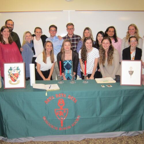 Students being inducted into the inaugural honor society