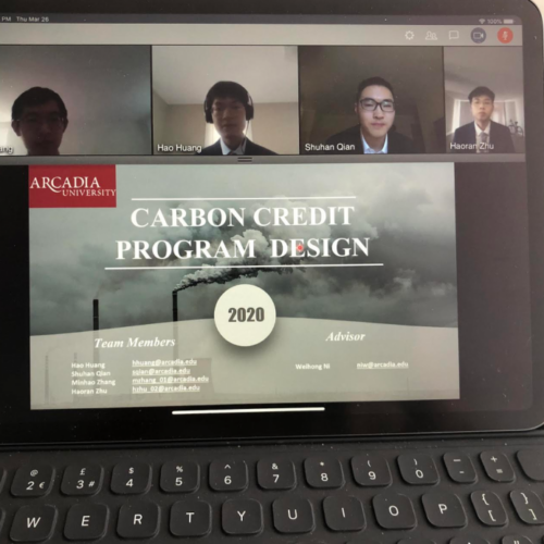 Laptop screen displaying a conference view of "Carbon Credit Program Design 2020."