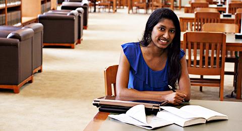 A student studying in Landman Library