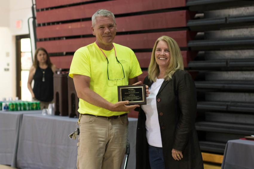 A faculty member receiving an award