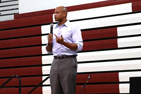 Wes Moore giving a speech in the gym.