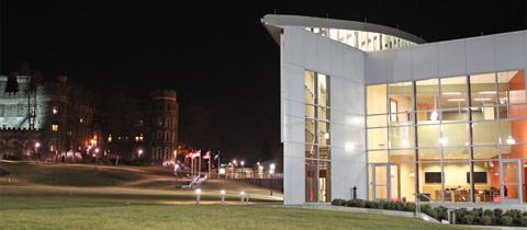 View of Commons and Grey Towers at night.