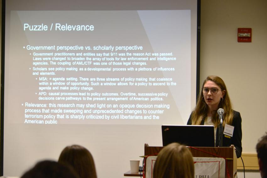 Political science majors presenting at a National Student Research Conference.