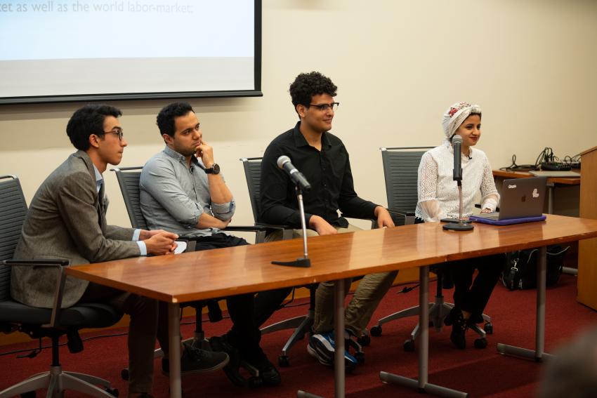 Several Egyptian students seated at the Egyptian STEM Student Showcase at Arcadia University