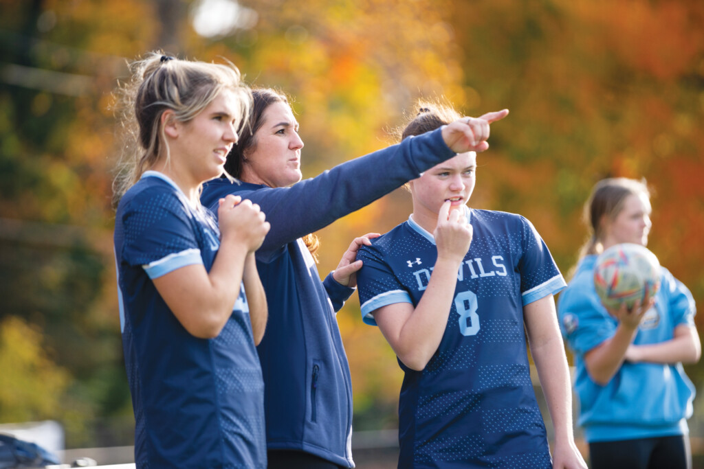 Maria DeGeorge-Kosmin '06 coaching the girls' soccer team at Springside Chestnut Hill Academy