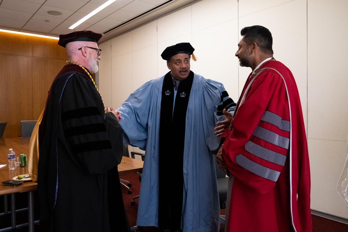 Neil deGrasse Tyson speaking with President Nair and Jeff Rutenbeck 