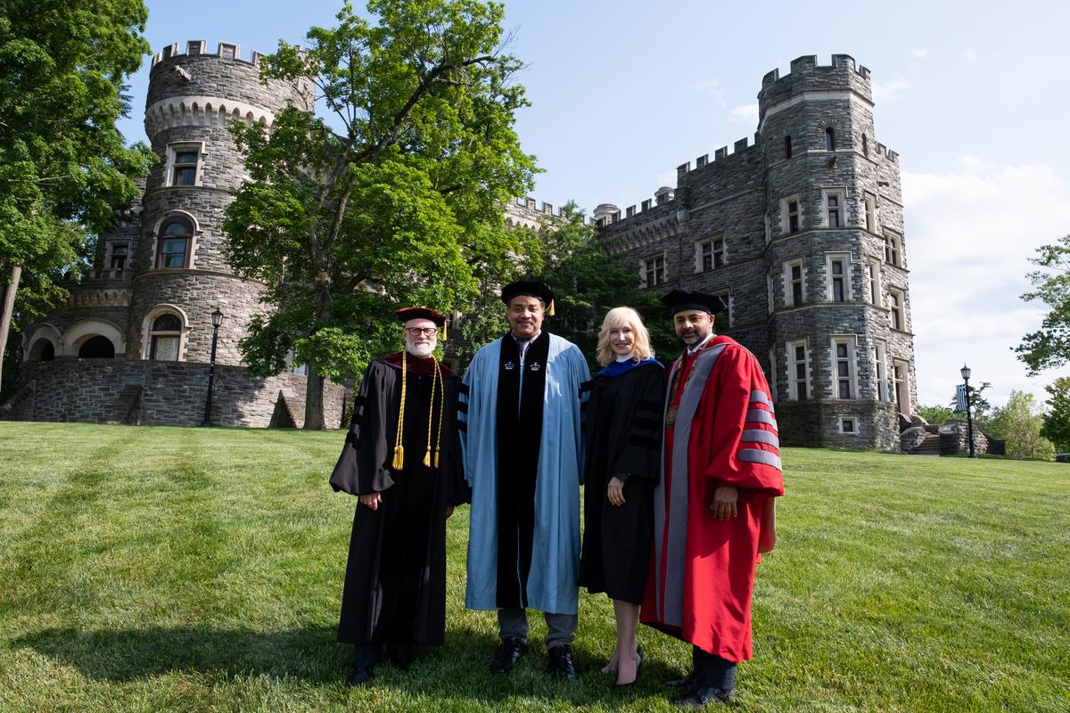 Neil deGrasse Tyson speaking with President Nair, Nancy Glass and Jeff Rutenbeck