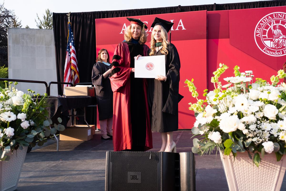 A student award recipient at the graduate commencement ceremony