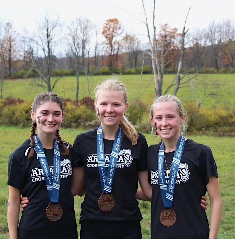 Micah and two of her teammates after the race.