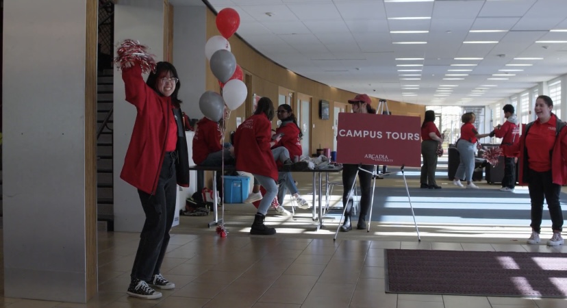 Students preparing to lead guests on tours.