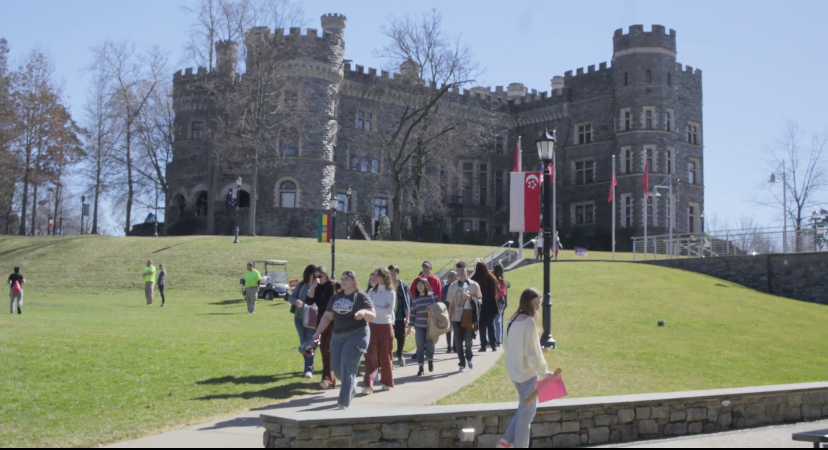 A tour walking across campus.