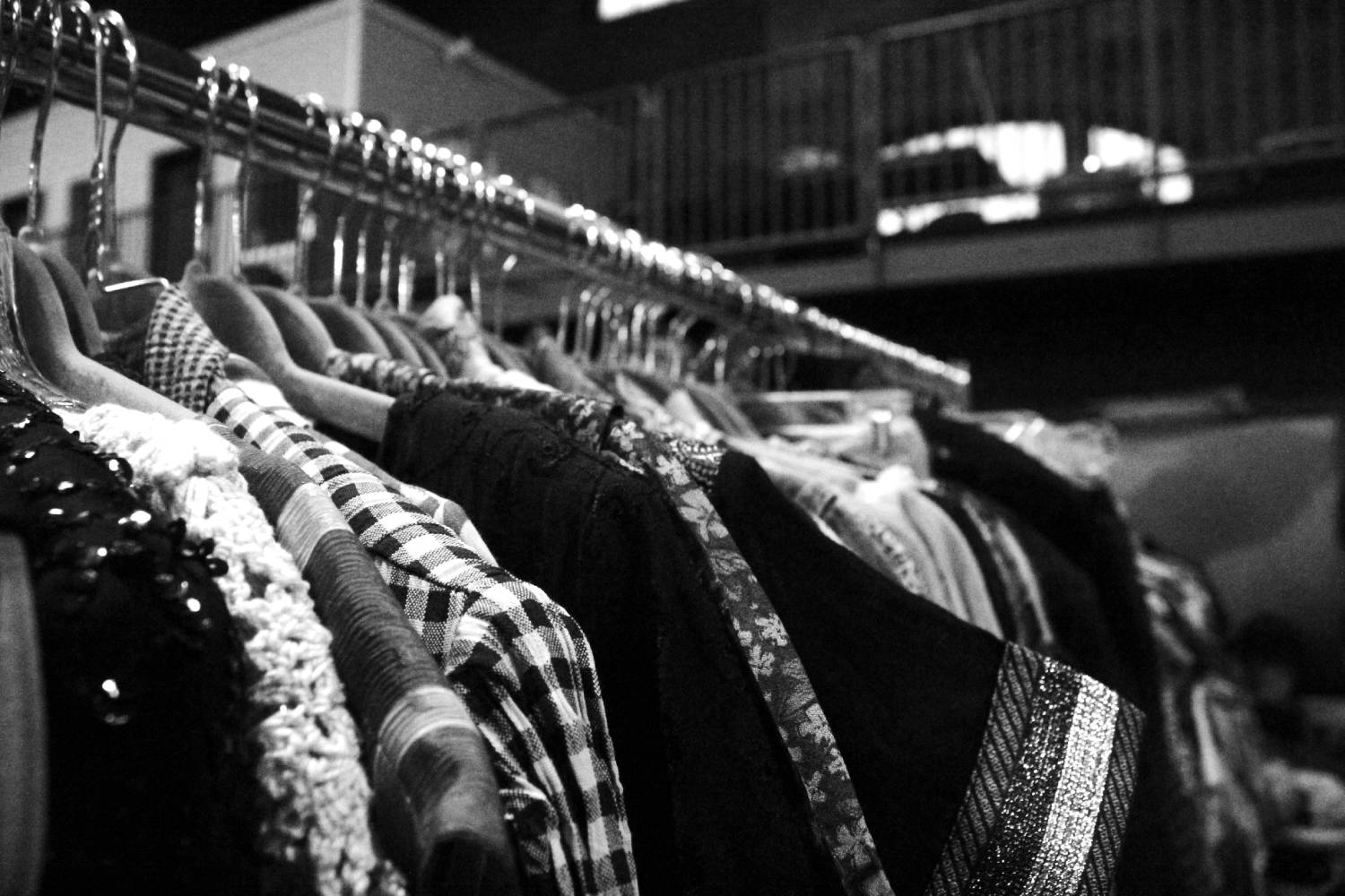 A rack of clothing on display.