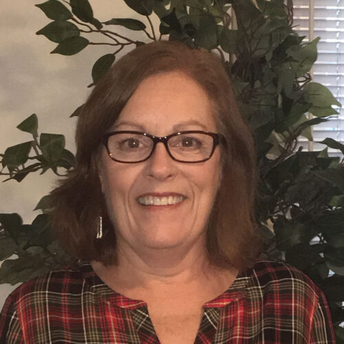 The headshot of Carol A. Lyman