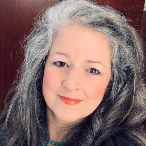 Selfie portrait of Michelle Dean.