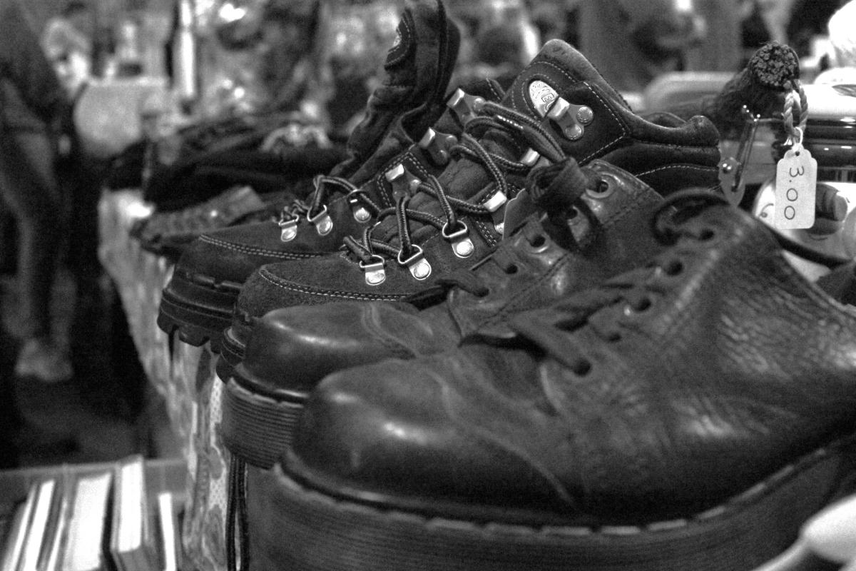 Different combat boots on display to be sold.