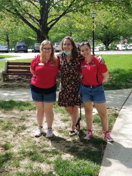 Three Honors students having their picture taken.