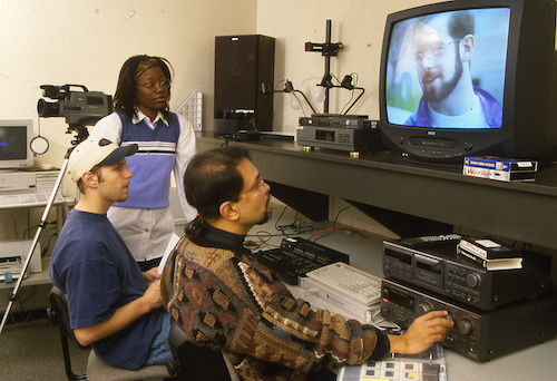 Dr. Deshpande working with students.