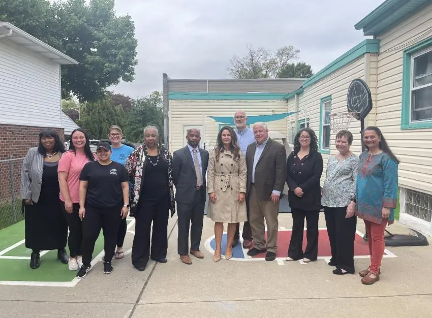 Outdoor group portrait of Dr. Priscilla Jeter-Iles (Director, Field Experiences and Outreach); Maria Cabrera ’22 and Briana Anastasia ’21, from the apprenticeship program; Amy Gavaghan, program director of Dumpling Grounds; Maisha Jackson, from Sen. Haywood's office; PA State Representative Napoleon Nelson; PA Dept. of Labor Sec. Jennifer Berrier; Dr. John Noakes (Interim Dean of the School of Ed.); PA State Representative Michael Driscoll; Dr. Jodi Bornstein (Associate Professor of Ed.); Dr. Kathy Trainor (Coordinator of Early Childhood Education Fieldwork and Adjunct Professor of Education); and Dr. Foram Bhukhanwala (Associate professor / Program Director, School of Ed.)