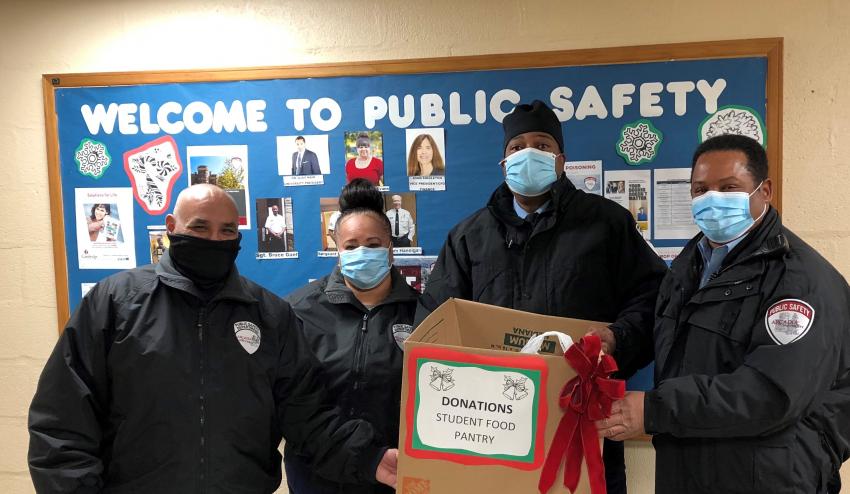 A group photo of Public Safety helping with Student Food Pantry donations