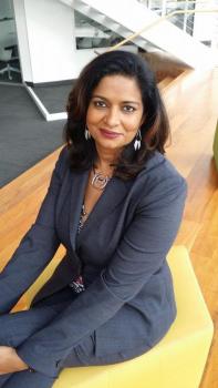 Rashmi Radhakrishnan seated indoors at Arcadia