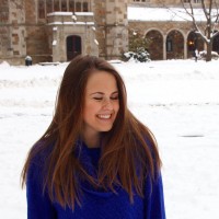 Headshot of Ali Barzyk smiling in the snow.
