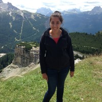 Melissa Thomspon on a mountain range.