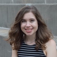 A portrait of Brooke Stephens / a woman wearing a striped tank top shirt