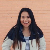 Image of Lida Lech, a female student with dark hair, smiling at the camera