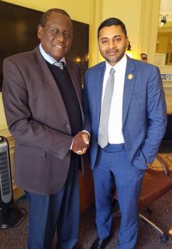 President Nair and Ambassador to Kenya shake hands.