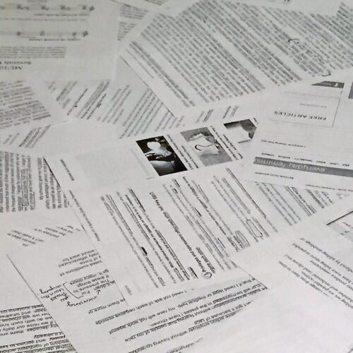 A pile of various papers and music sheets.