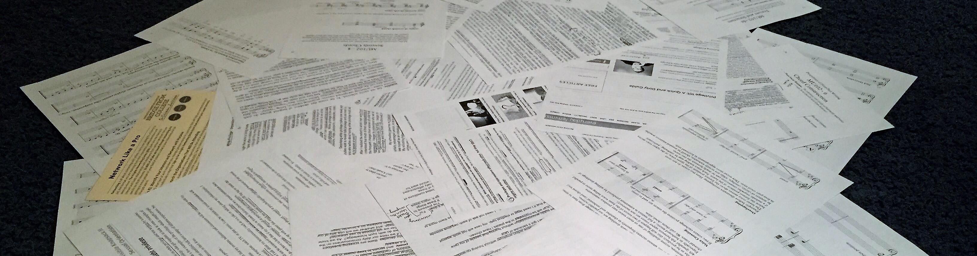 A pile of various papers and music sheets.