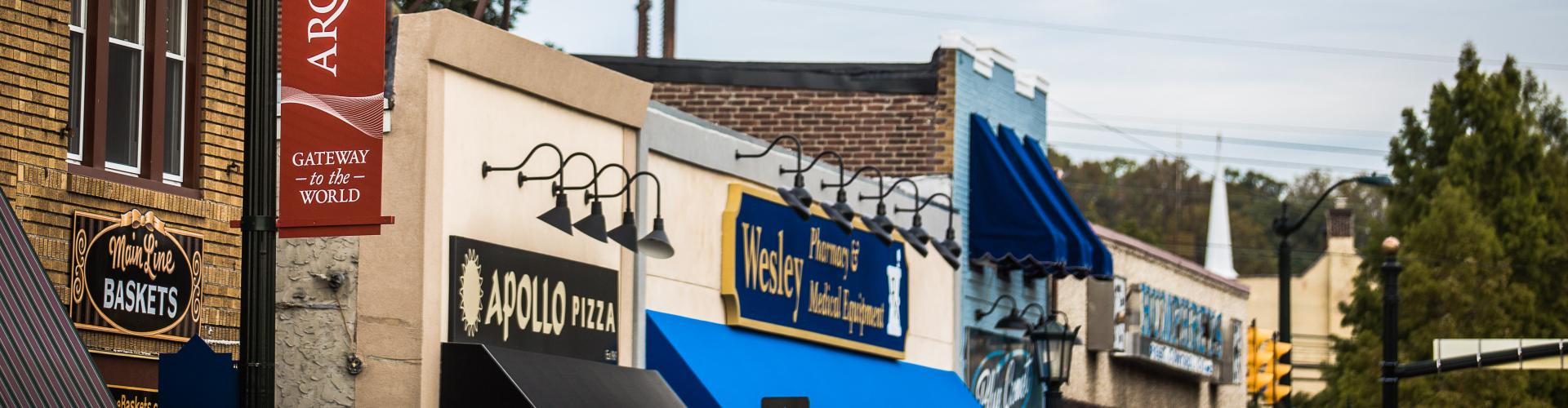 The signs and awnings of Downtown Glenside, PA shops and restaurants