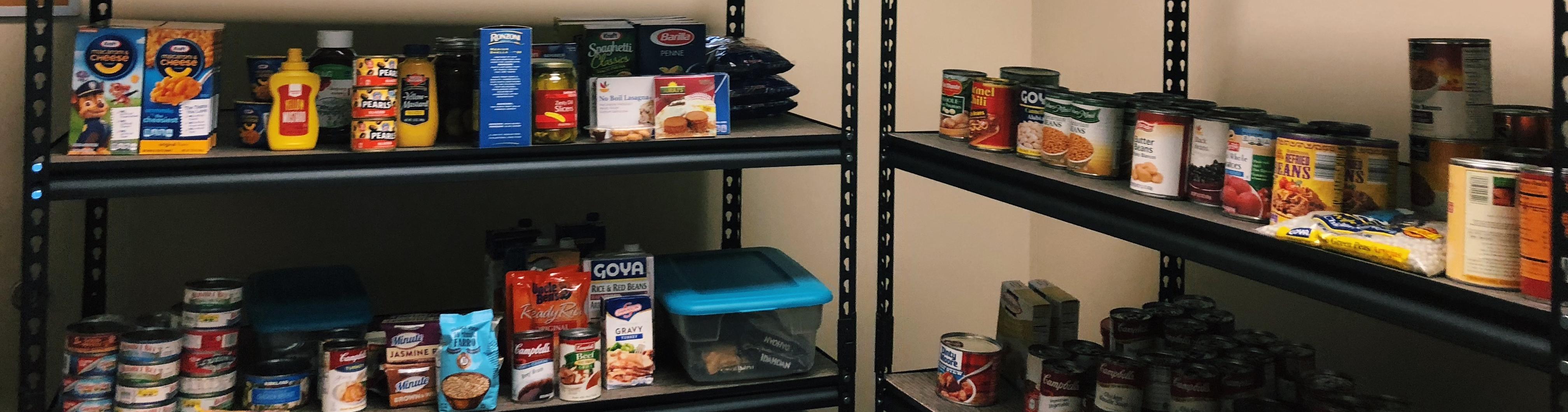 Food pantry shelves filled with supplies.