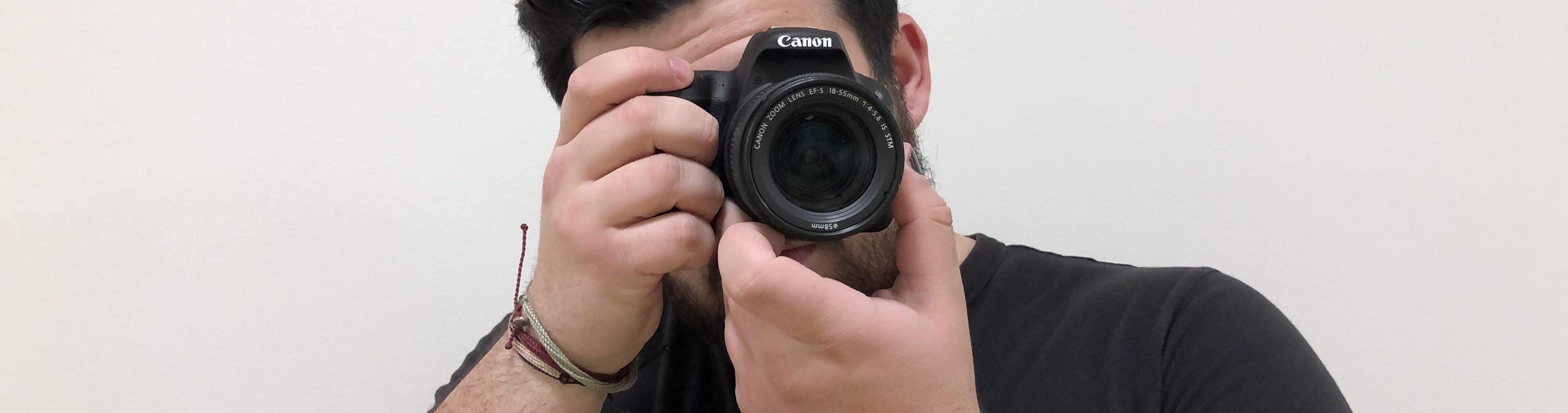 A person holding a camera