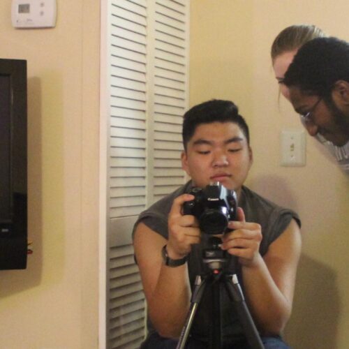 Students analyzing a camera