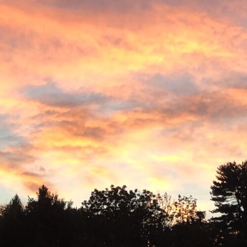 A sunset with pink clouds.