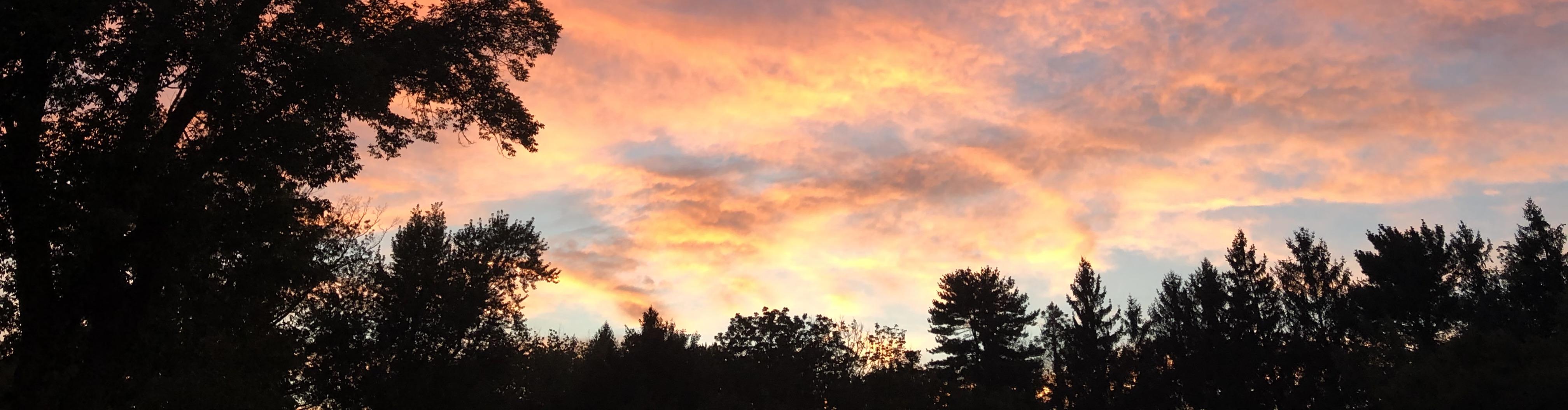 A sunset with pink clouds.