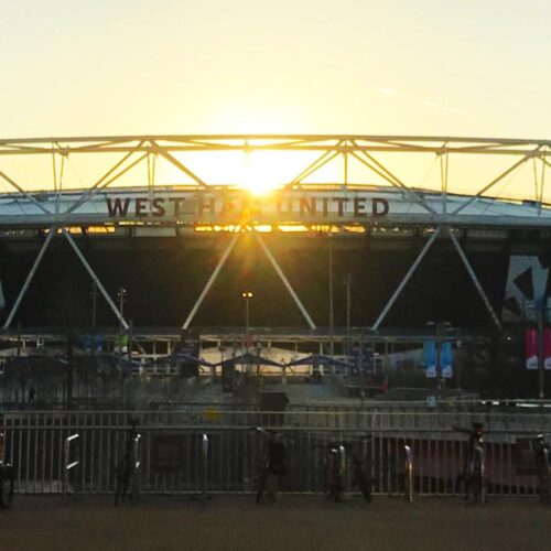 West Ham United soccer stadium at sunset.