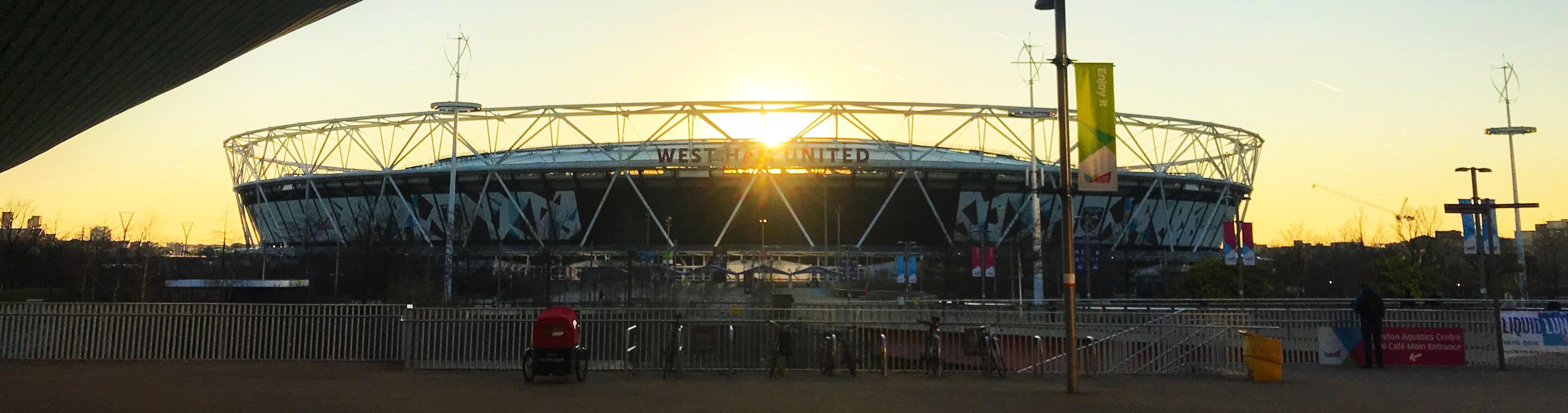 West Ham United soccer stadium at sunset.