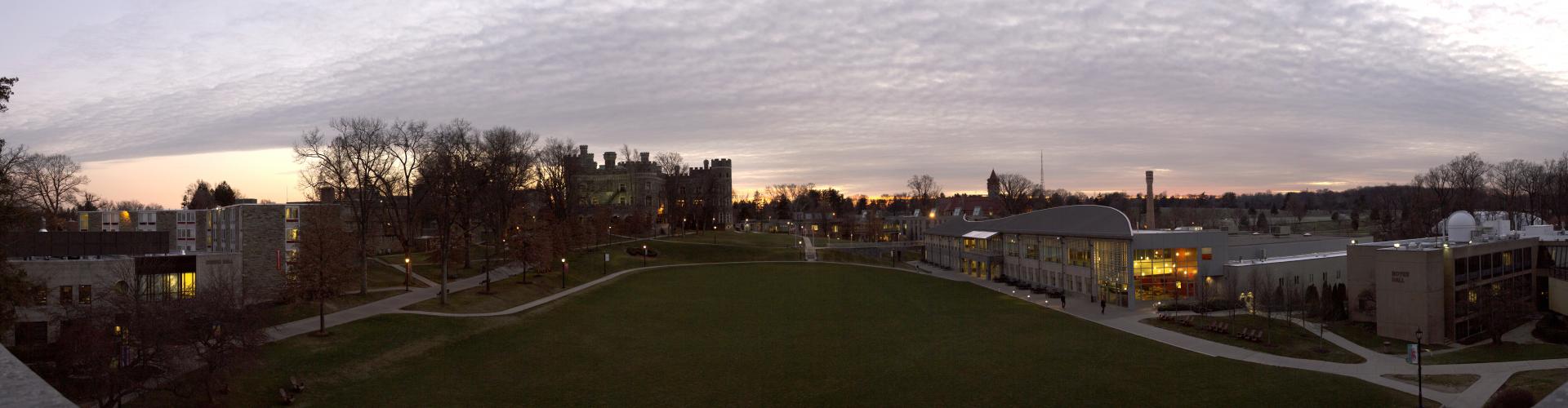 A panorama of Arcadia's campus at dusk